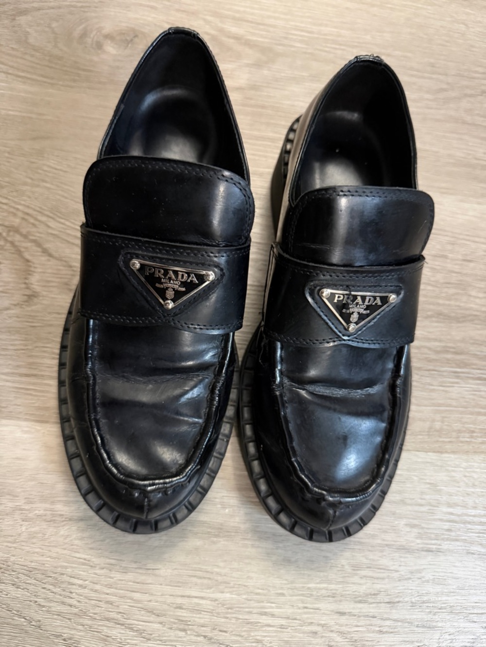 Prada Black Leather Penny Loafers with Metal Triangle Logo - Picture 2 of 16